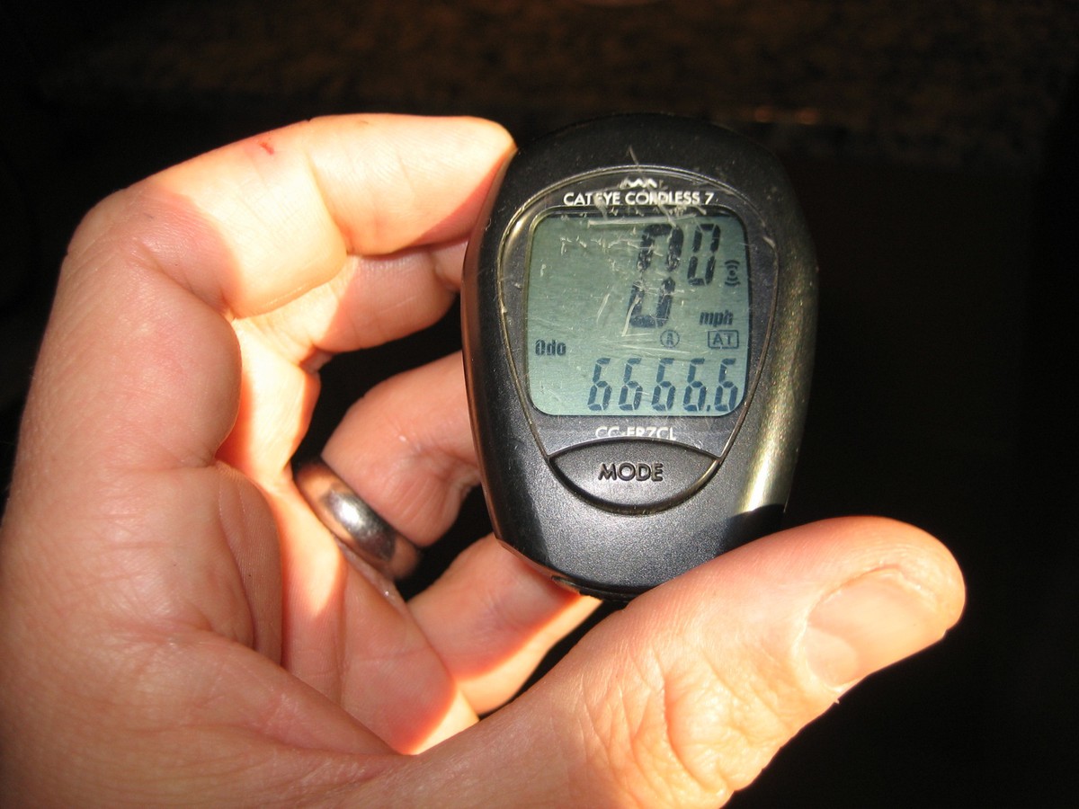 Closeup: bike computer showing 6,666.6 mi on the odo