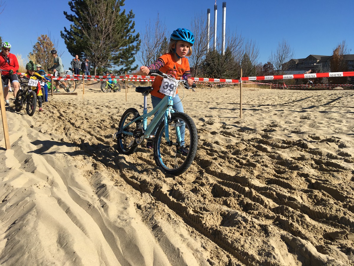2017: Iris on the volleyball court, with the Old Mill in the Background