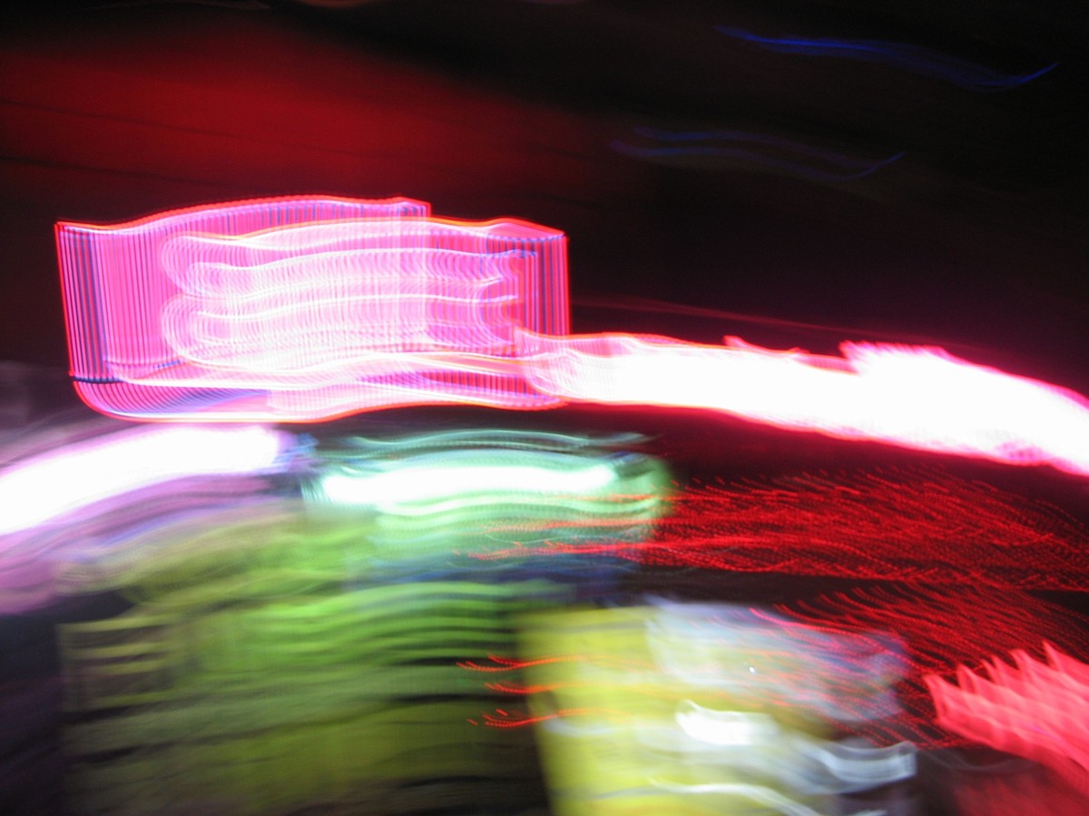 Artily smeared photo of colorful neon lights