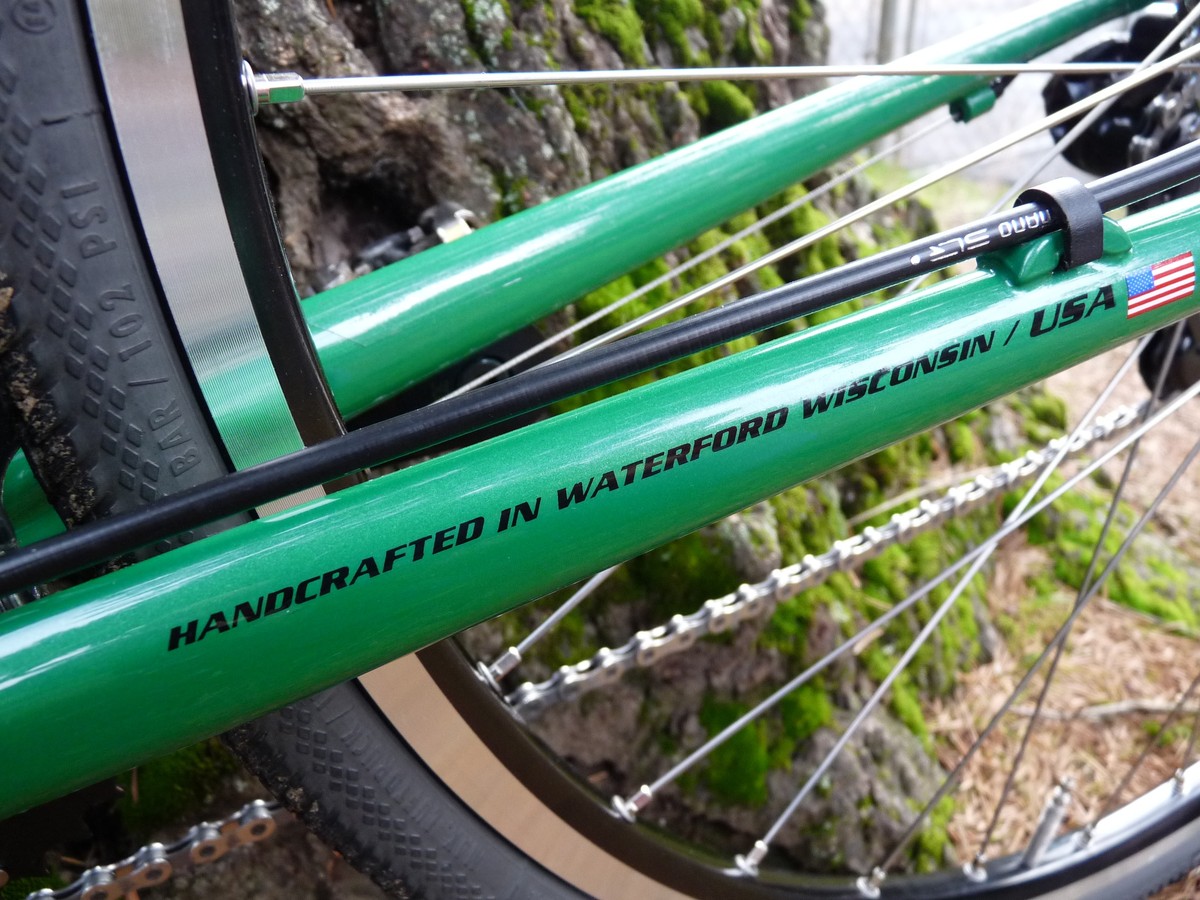 Closeup of chainstays on a brand new bicycle. Decal reads: “Handcrafted in Waterford Wisconsin/USA 🇺🇸”
