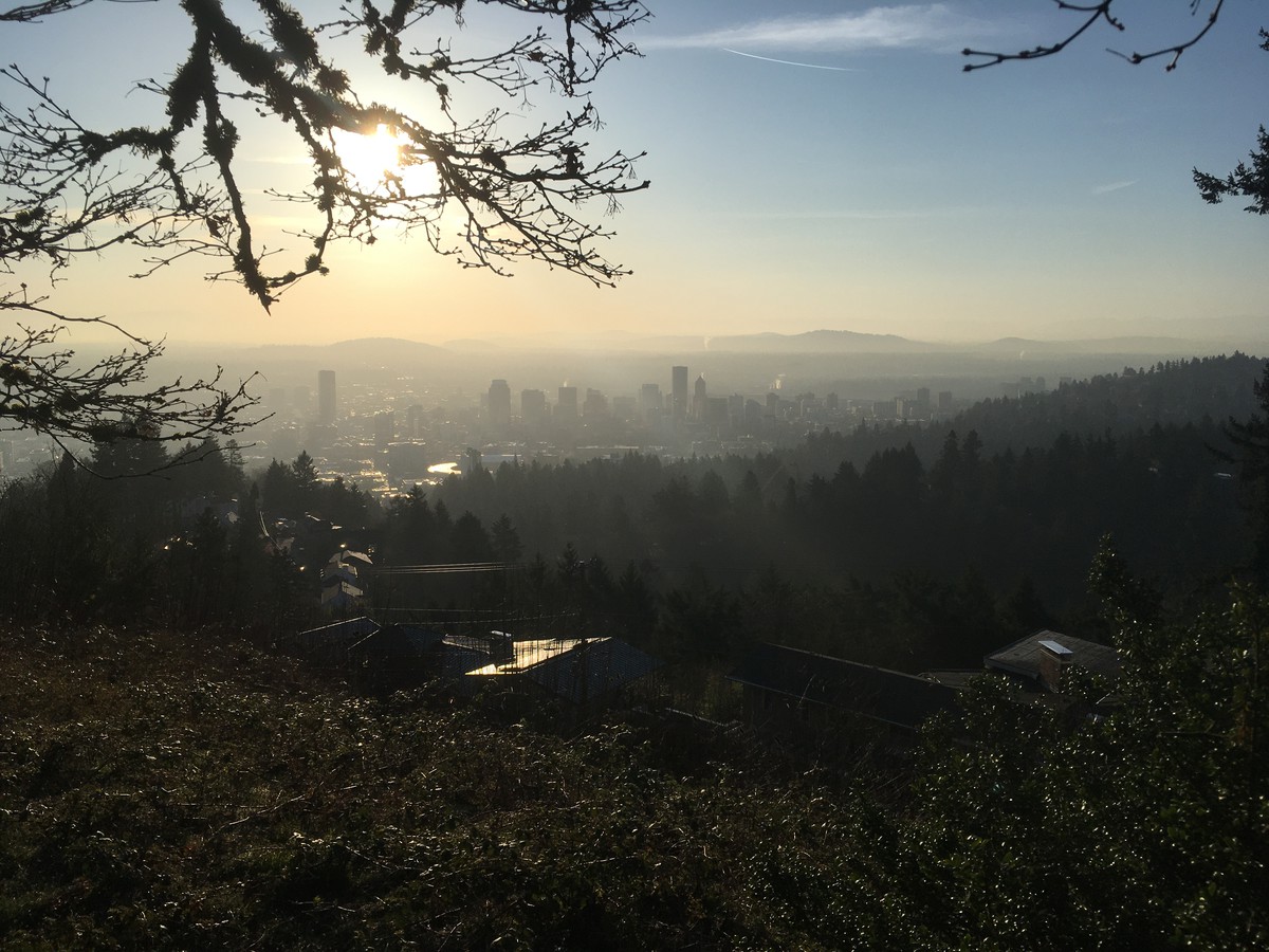 Portland at sunrise from Pittock Mansion on a clear but hazy spring day