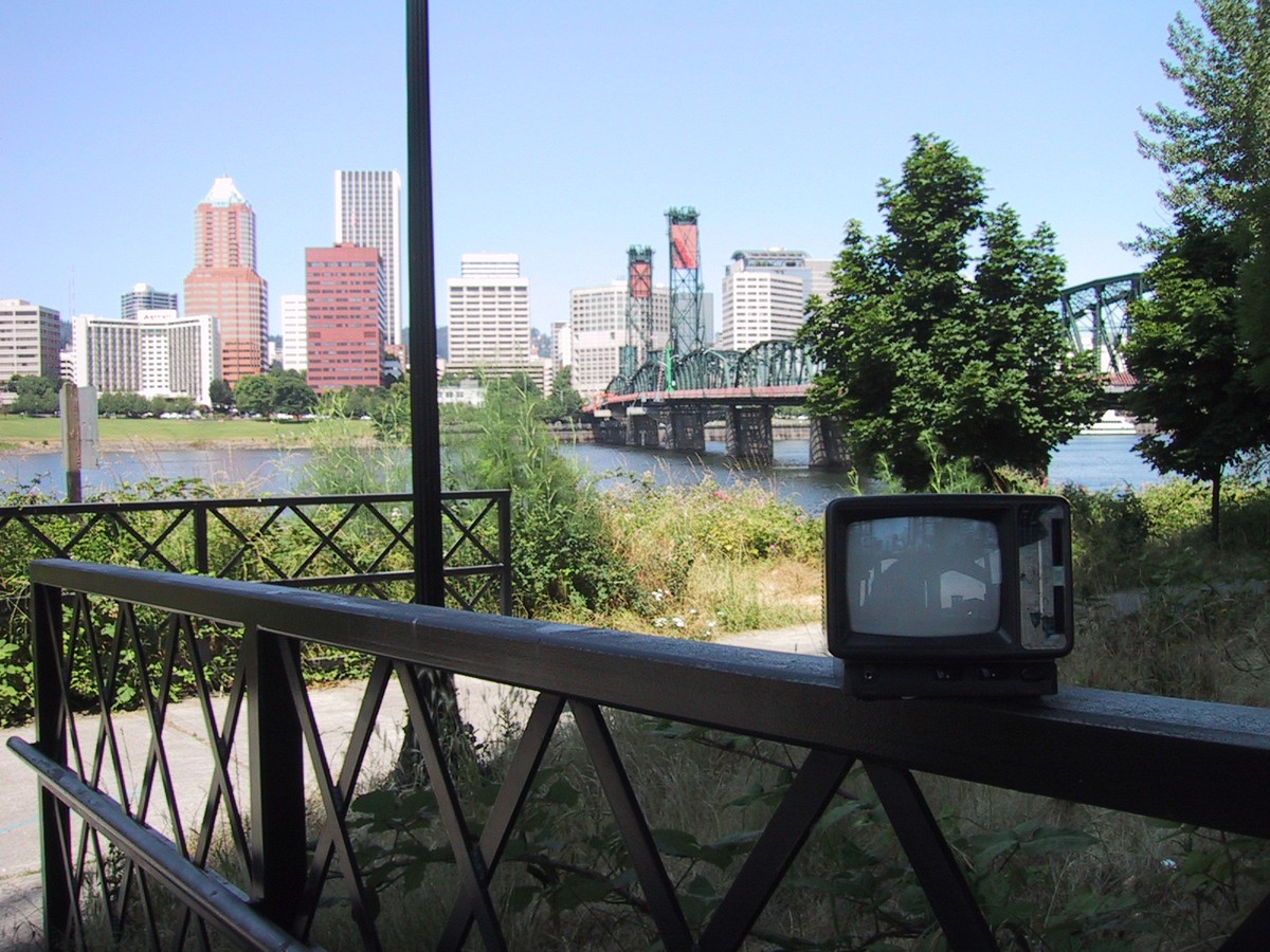 Landscape taken from north of the Hawthorne Bridge toward downtown; in the foreground a portable TV