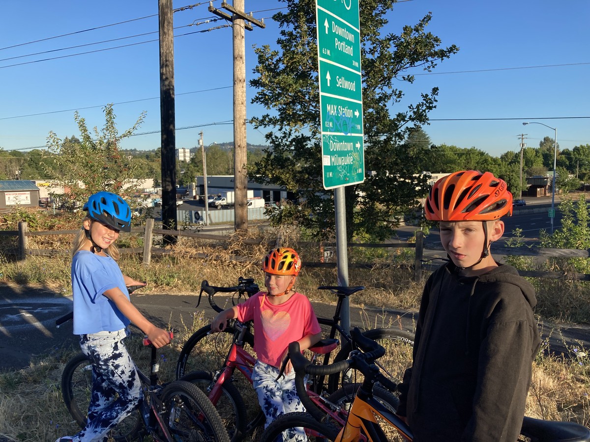 All three kids on our remote schooling “commute”
