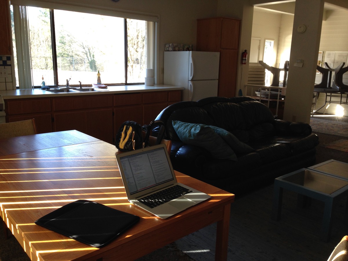 HOA pool house, late fall, afternoon light, my work computer on a table in the foreground