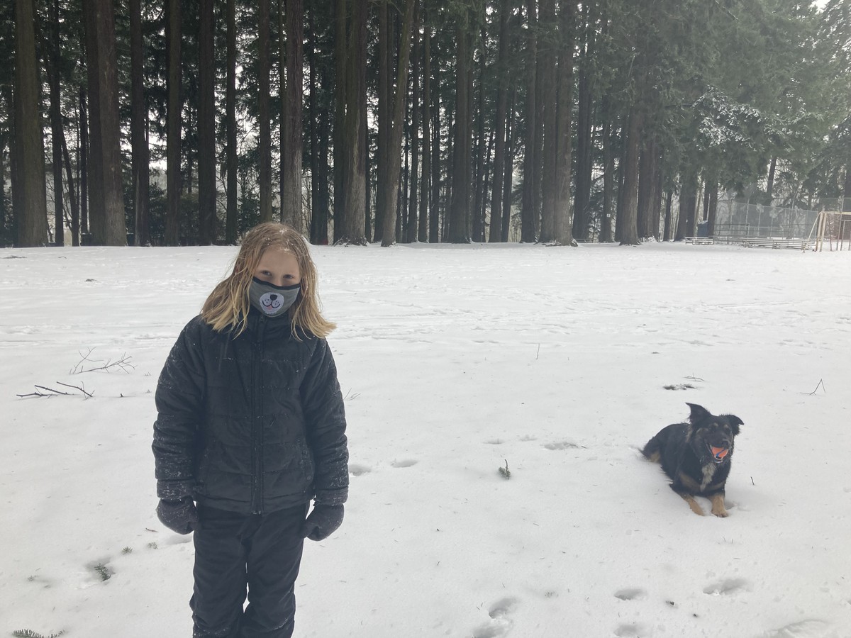 Ada and Kuma in the snow at the park