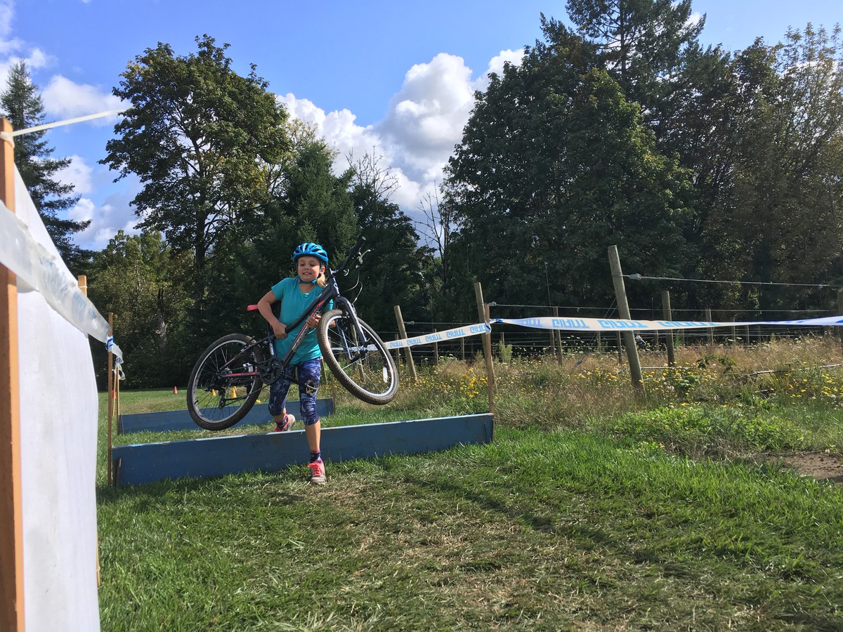 Iris horses her commuter over the barriers, 2019