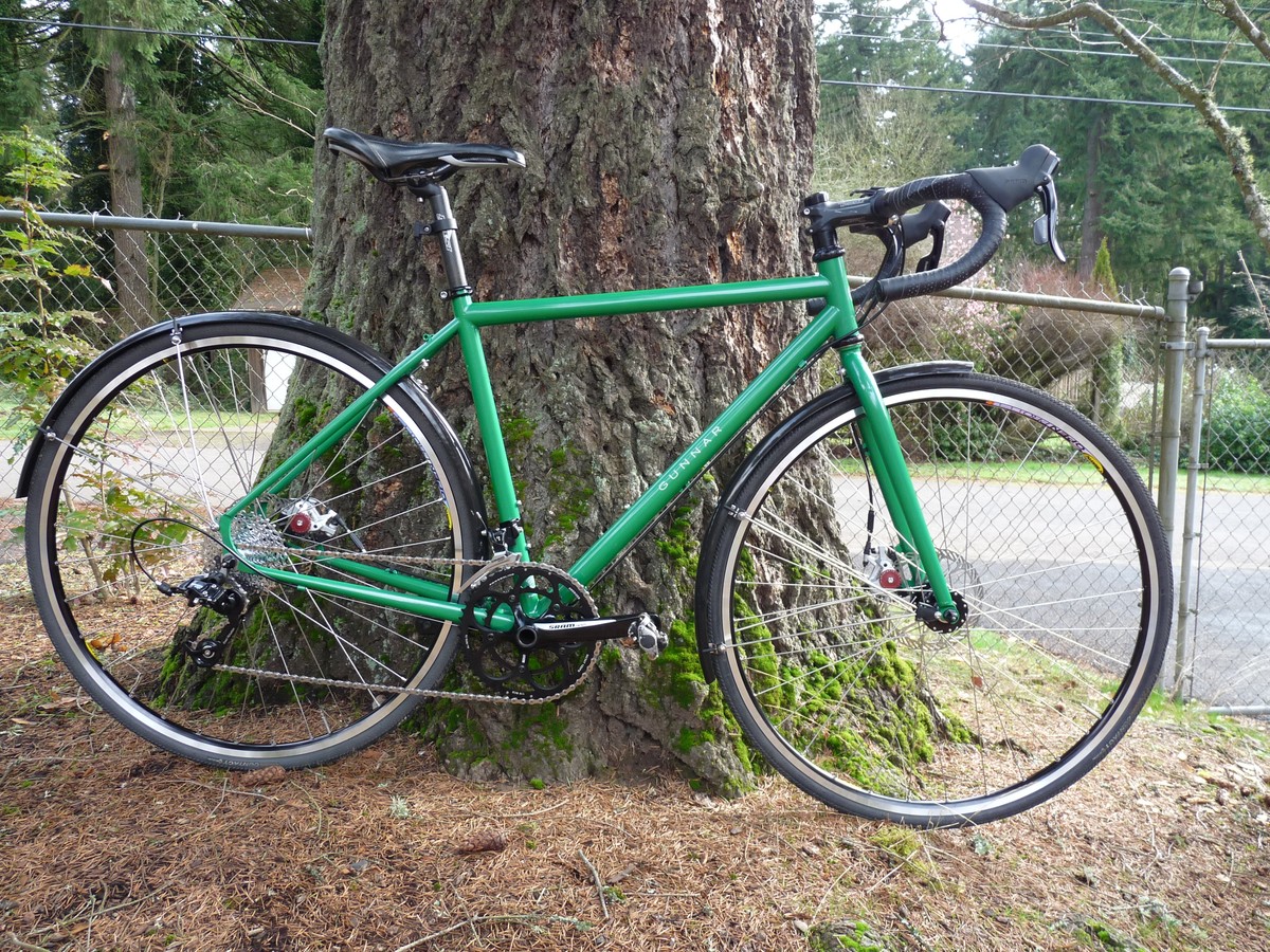 Shiny new Gunnar Fastlane leaning against a large Douglas fir tree