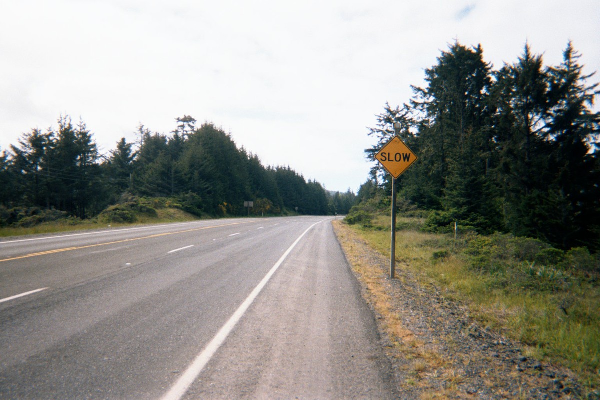 Road sign on Hwy 101 reading “slow”