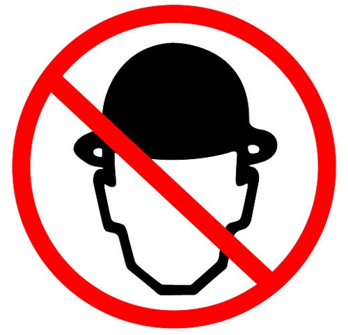 Illustration/logo in Internation Style: red “forbidden” circle with slash through a stylized man wearing a hat