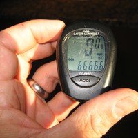 Closeup: bike computer showing 6,666.6 mi on the odo
