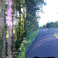 Digitally distorted view of a bicycle path at sunset in the summer
