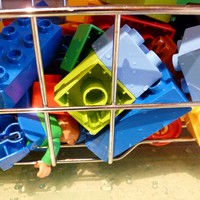 Closeup of Lego Duplo blocks in a dish drainer