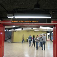 LED information board in the Hong Kong subway, 2007. Text on the display reads “General failure writing drive c”