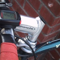 Closeup of the stem and computer on a Bianchi bicycle