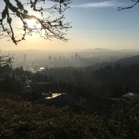 Portland at sunrise from Pittock Mansion on a clear but hazy spring day