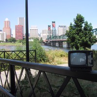 Landscape taken from north of the Hawthorne Bridge toward downtown; in the foreground a portable TV