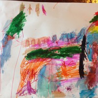 Colorful artwork by a preschooler, in ink and paint, of a castle