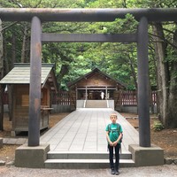 Orion in front of a minor shrine at the Hokkaido Shrine, June 2019