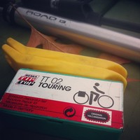 Closeup of a bicycle patch kit and tire levers