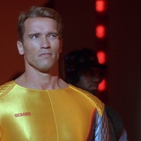 Still from RUNNING MAN with Arnold Schwarzenegger in a gold jumpsuit