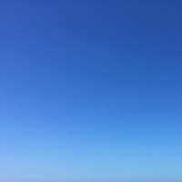 A clear blue sky with no clouds or other objects in it